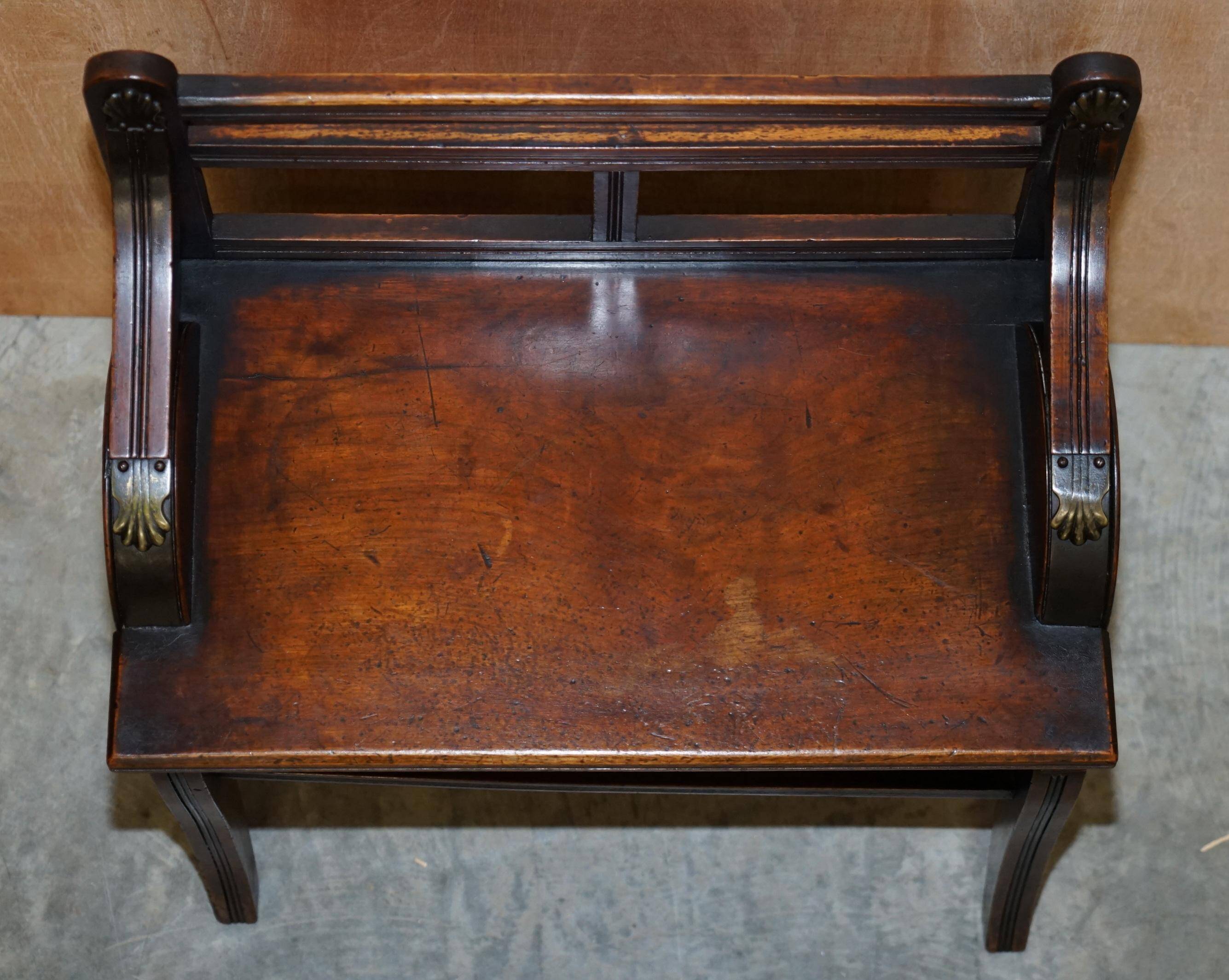 Antique entrance bench by Jas Shoolbred with brass fittings and walnut frame circa 1890.