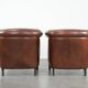 Unique set of two cognac-coloured cow leather club armchairs