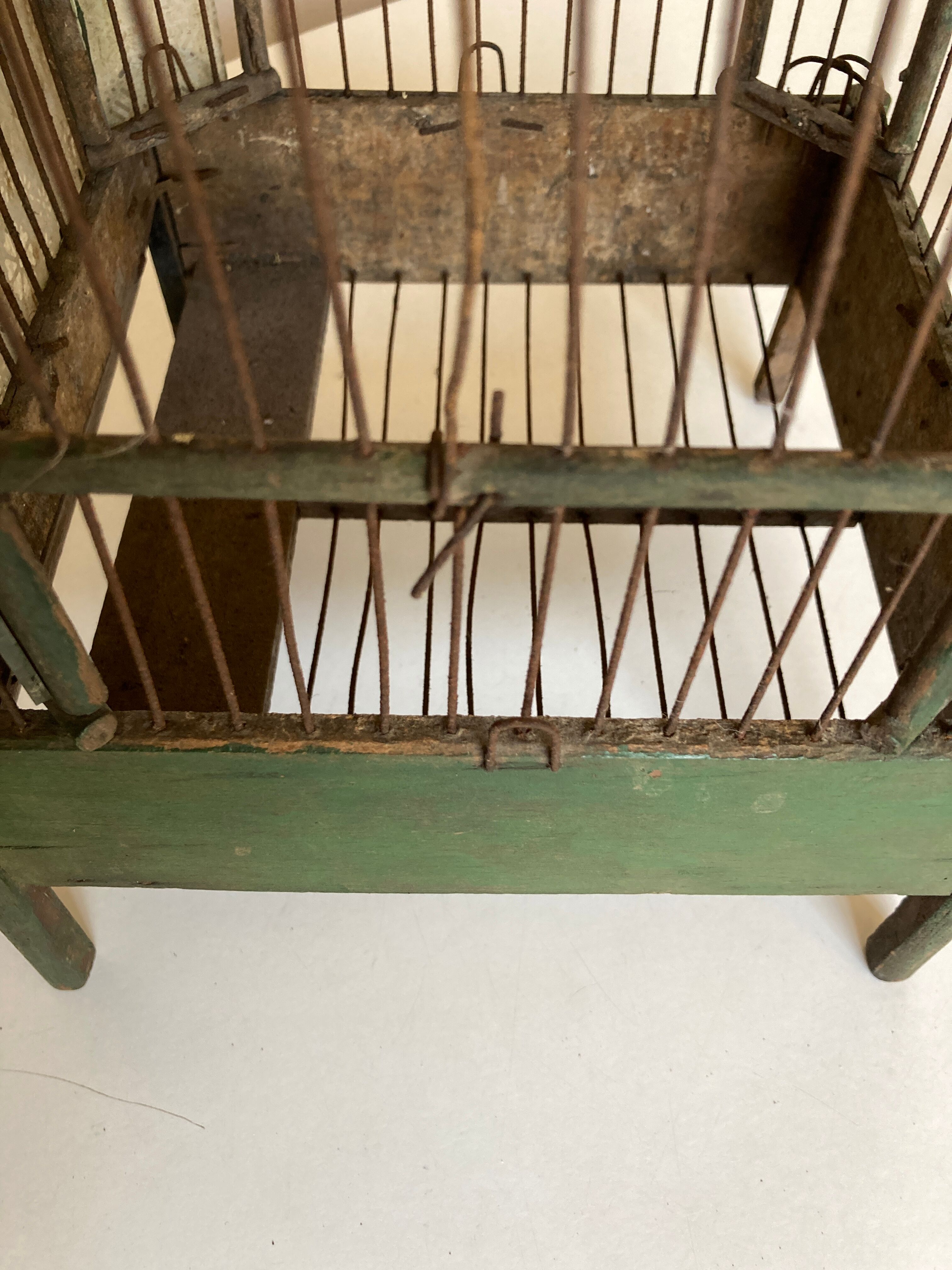 Octagonal bird cage made of wood and wire around 1920