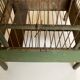Octagonal bird cage made of wood and wire around 1920