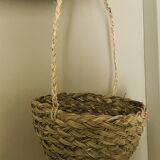 Hanging woven wicker planter