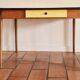 Old wooden farmhouse table and yellow formica top