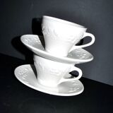 Set of 2 cups molded in opaque Sarreguemines earthenware