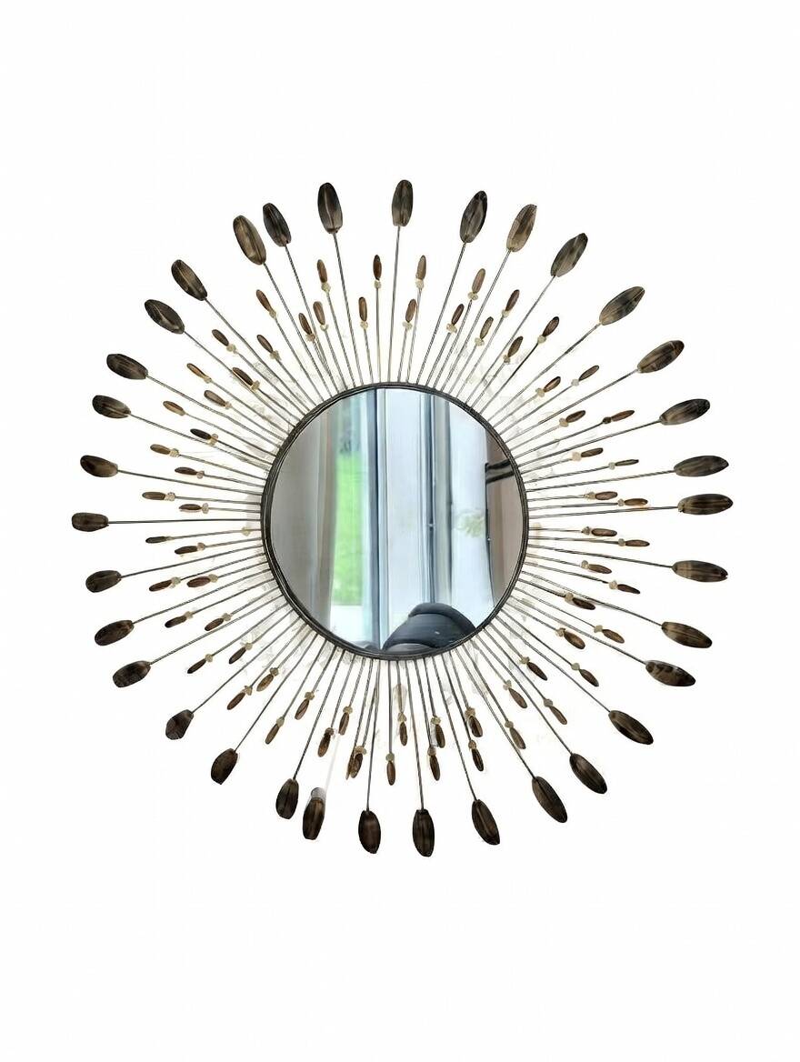 Vintage metal sun mirror in the style of Line Vautrin