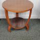 Round tripod vintage table