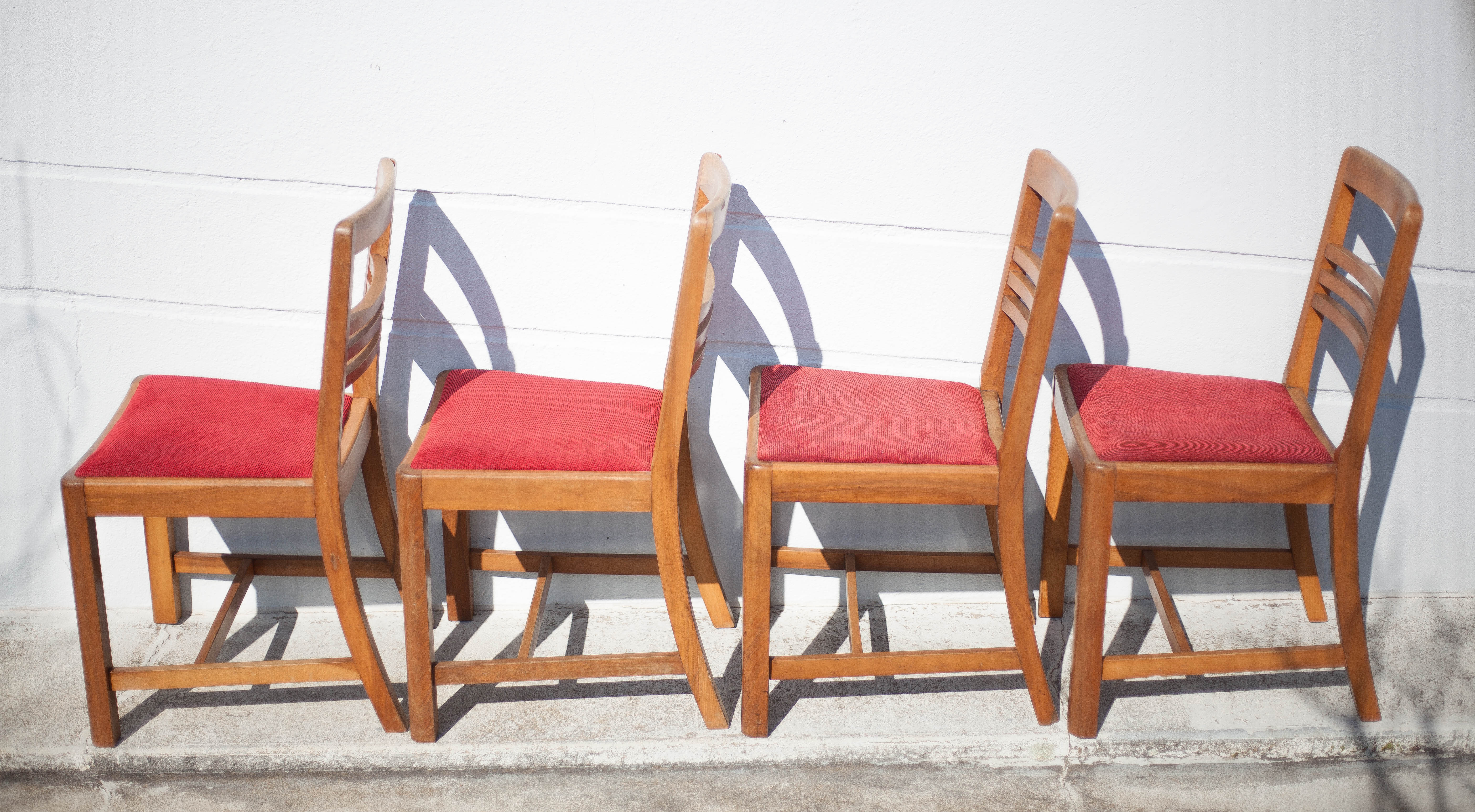 4 wooden chairs and velvet fabric