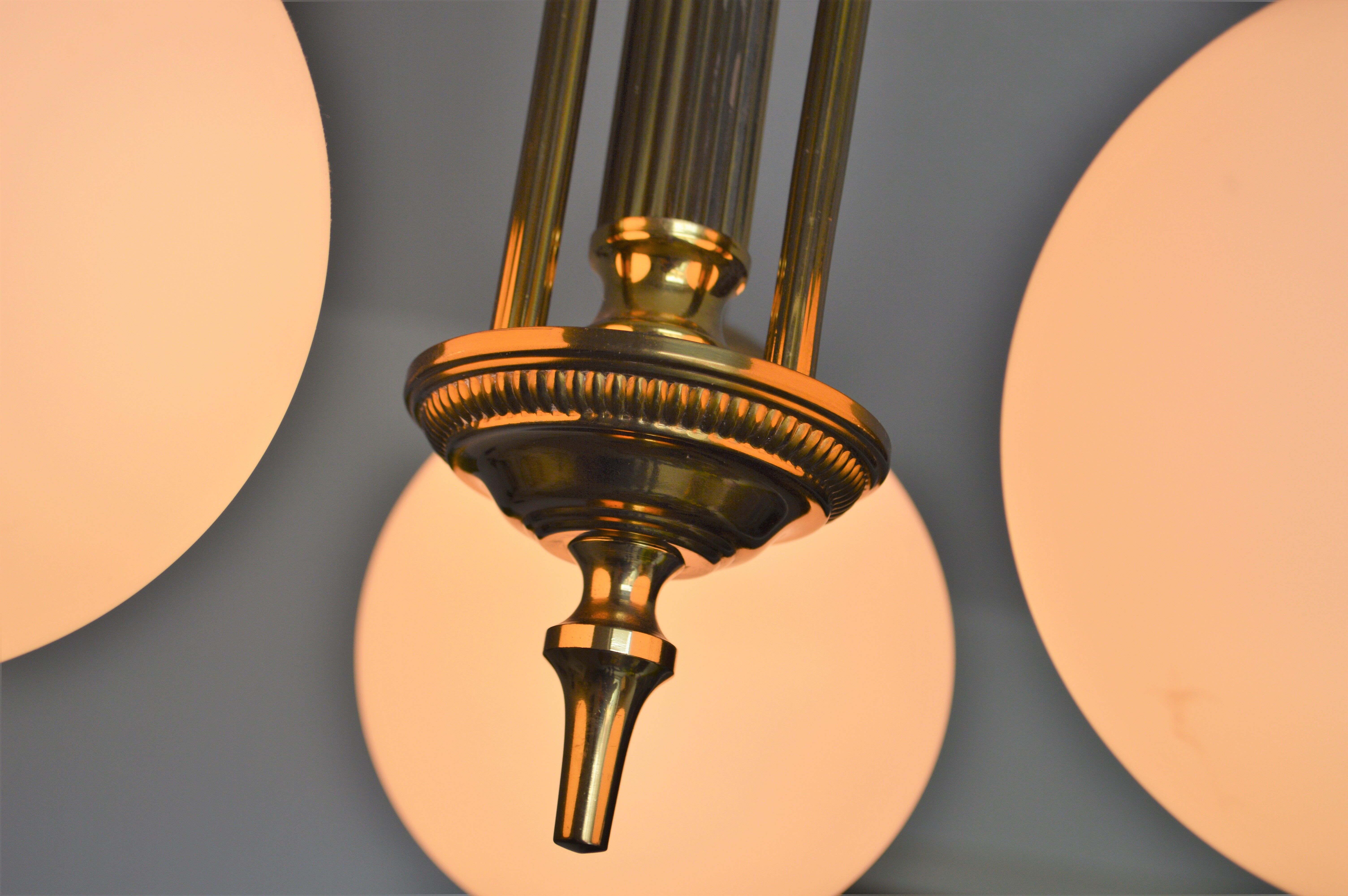 Vintage chandelier of the 60s in brass