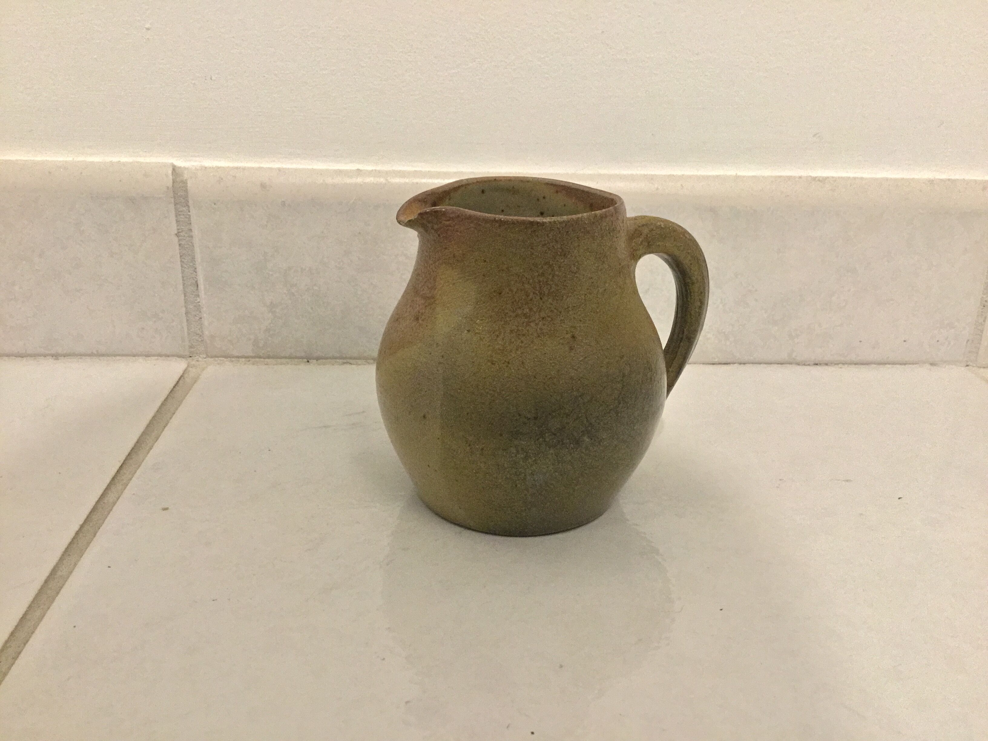 Sandstone milk pot