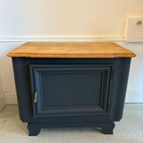 Mat black storage furniture, natural top.