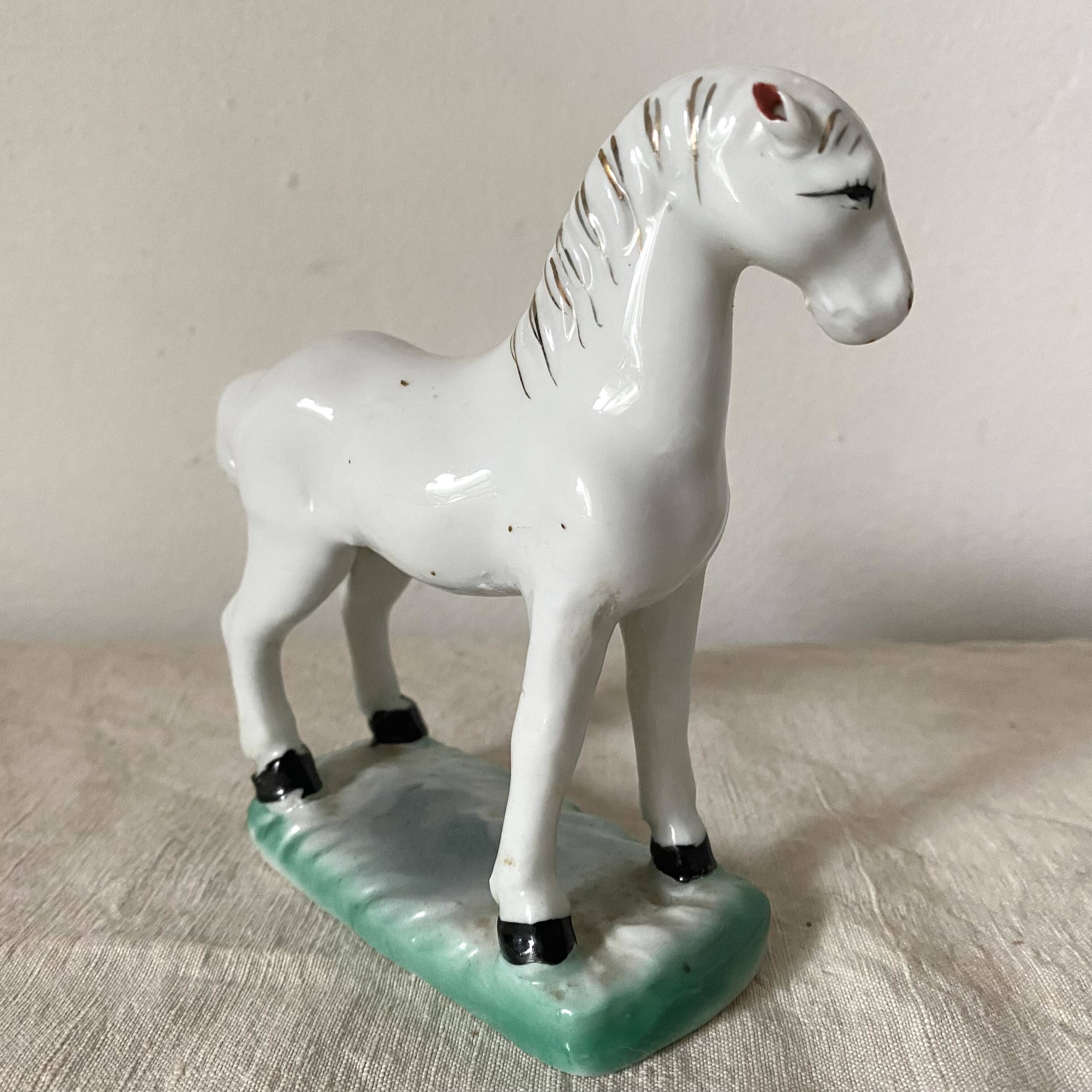 Vintage porcelain horse, Asia