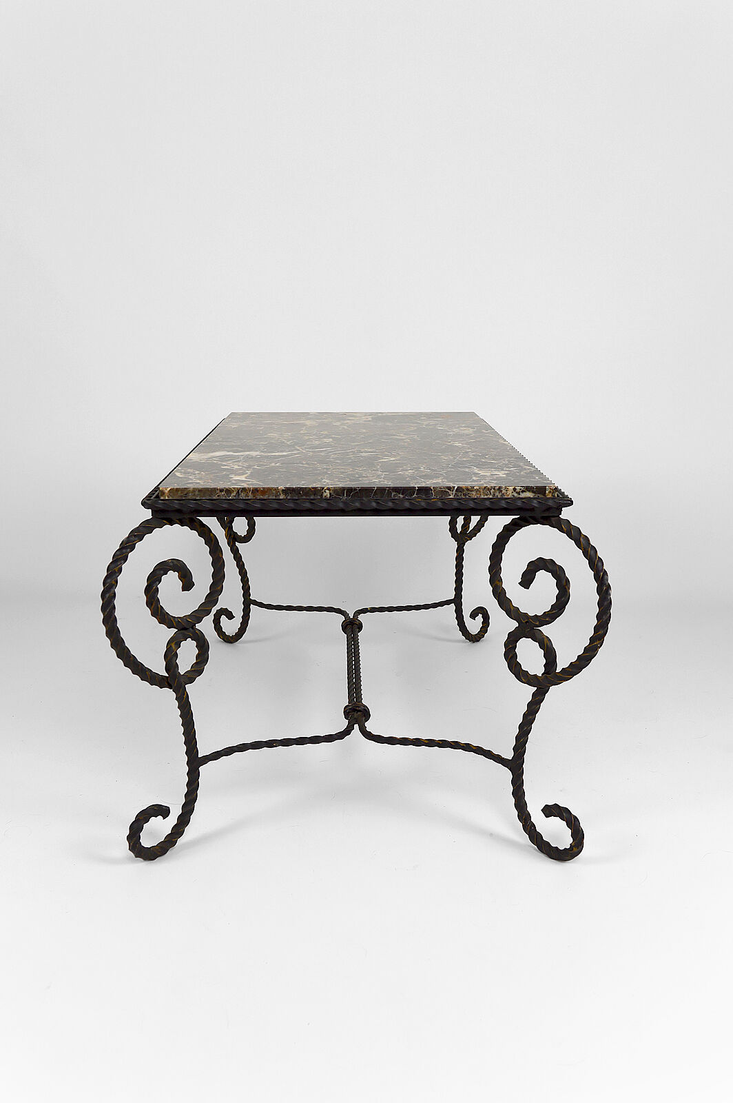 Coffee table in patinated wrought iron and marble, circa 1940