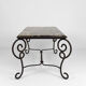 Table basse en fer forgé patiné et marbre, circa 1940