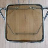 Trio of plexiglass folding chairs