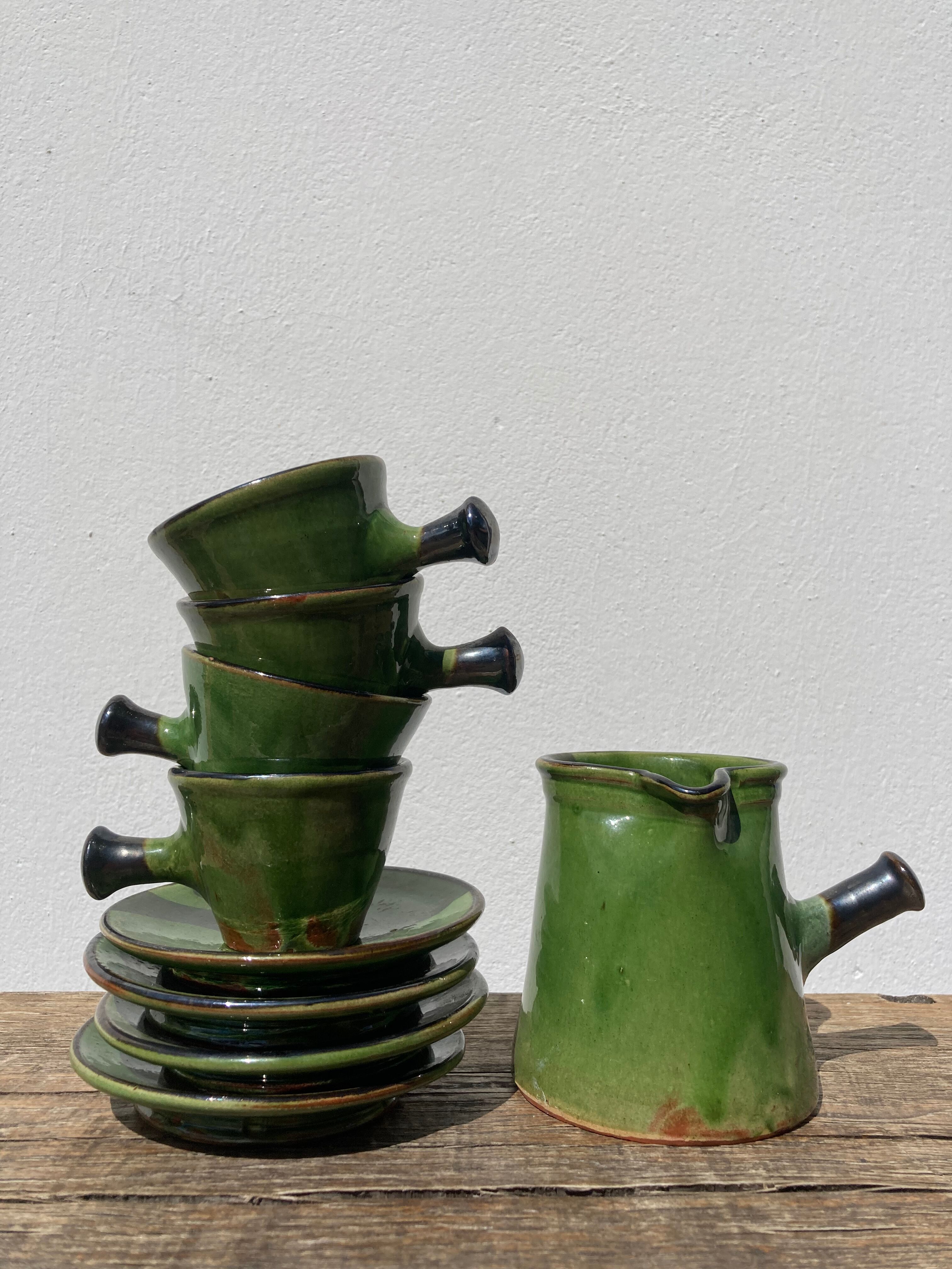 Coffee service signed Poterie de Marnaz including cups and pitcher in glazed terracotta