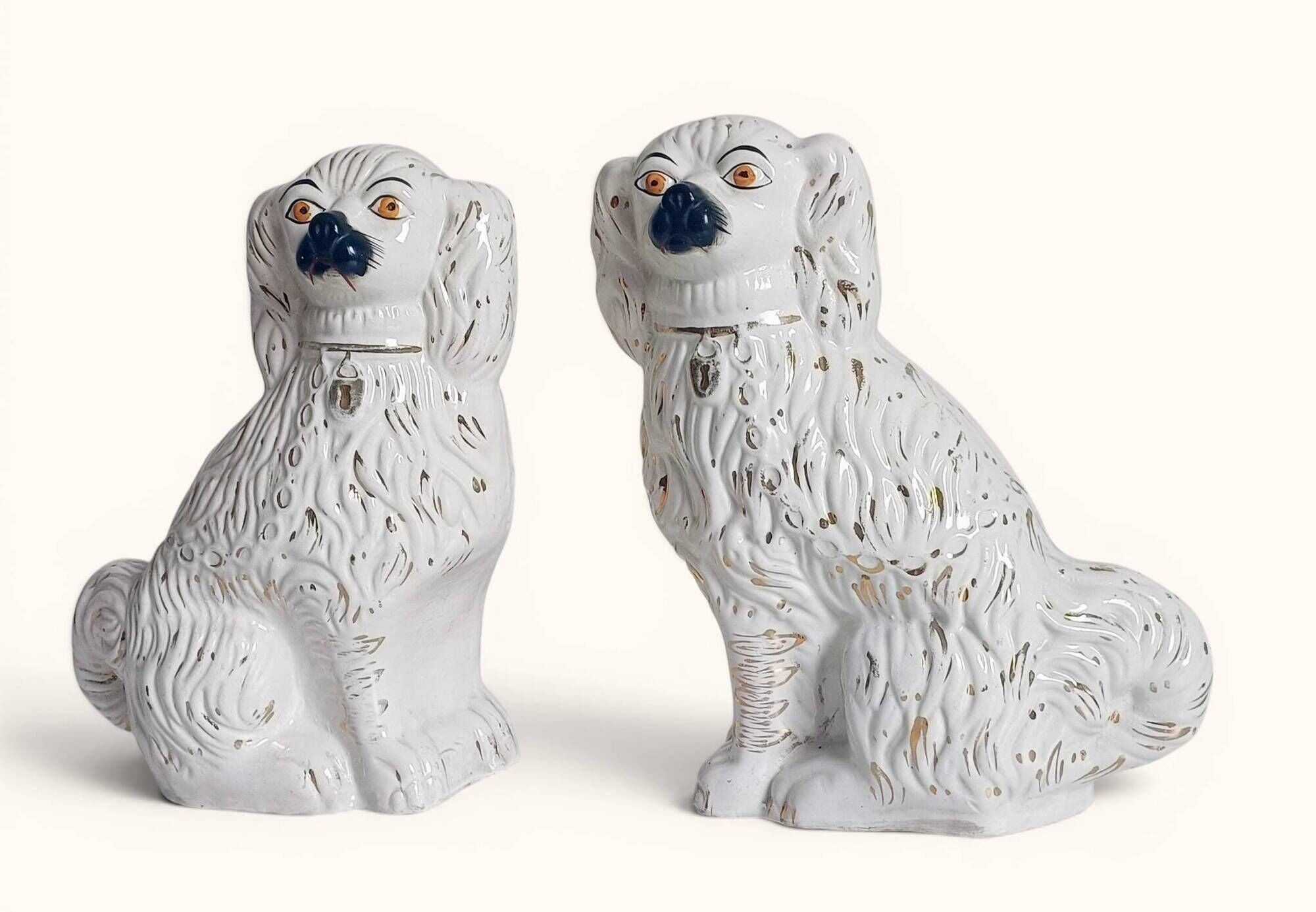 Pair of King Charles Spaniel dogs in Staffordshire majolica style.