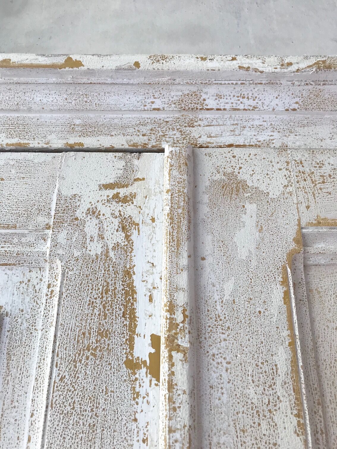 Antique wardrobe in patinated pine