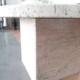 Round coffee table in travertine