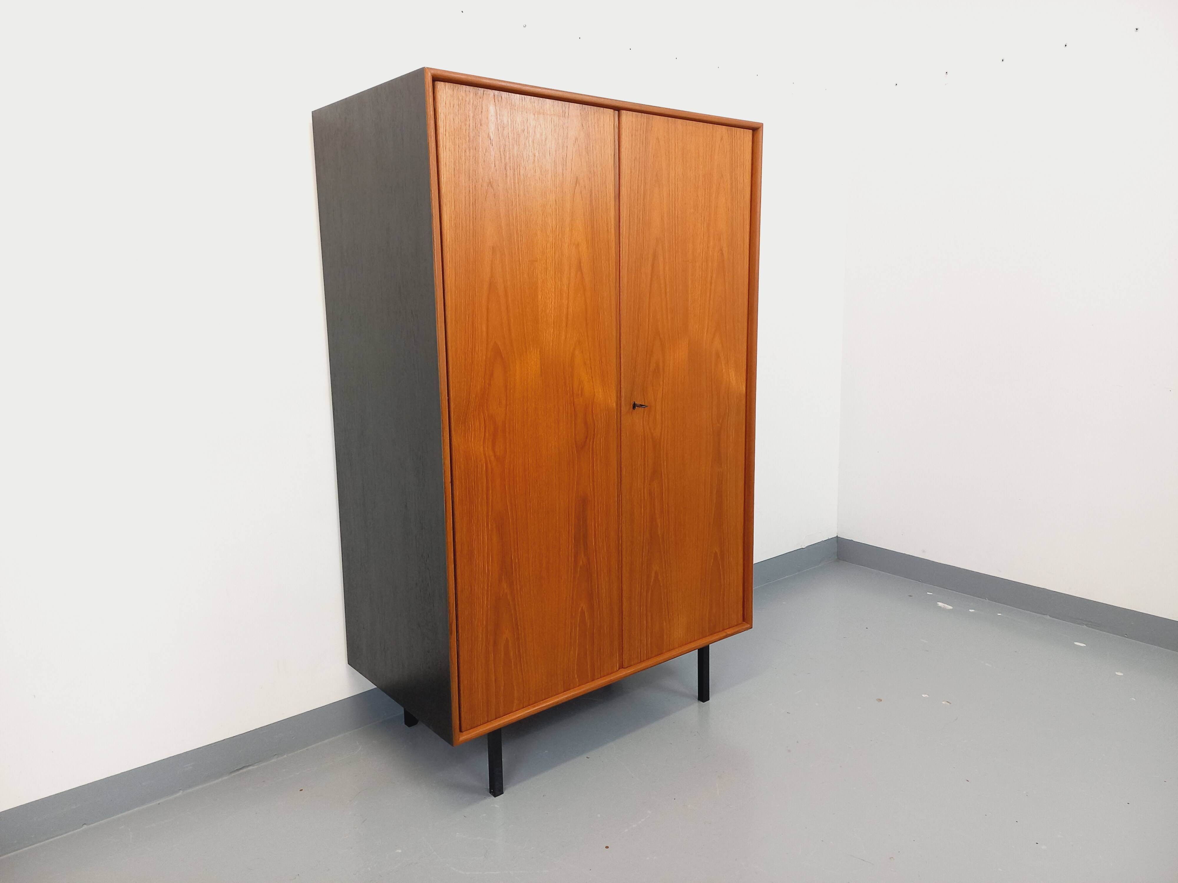Vintage Scandinavian modernist wardrobe in teak and metal from the 1960s.