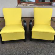 Pair of yellow Art Deco armchairs in cotton and wood, black frame, 1920s.