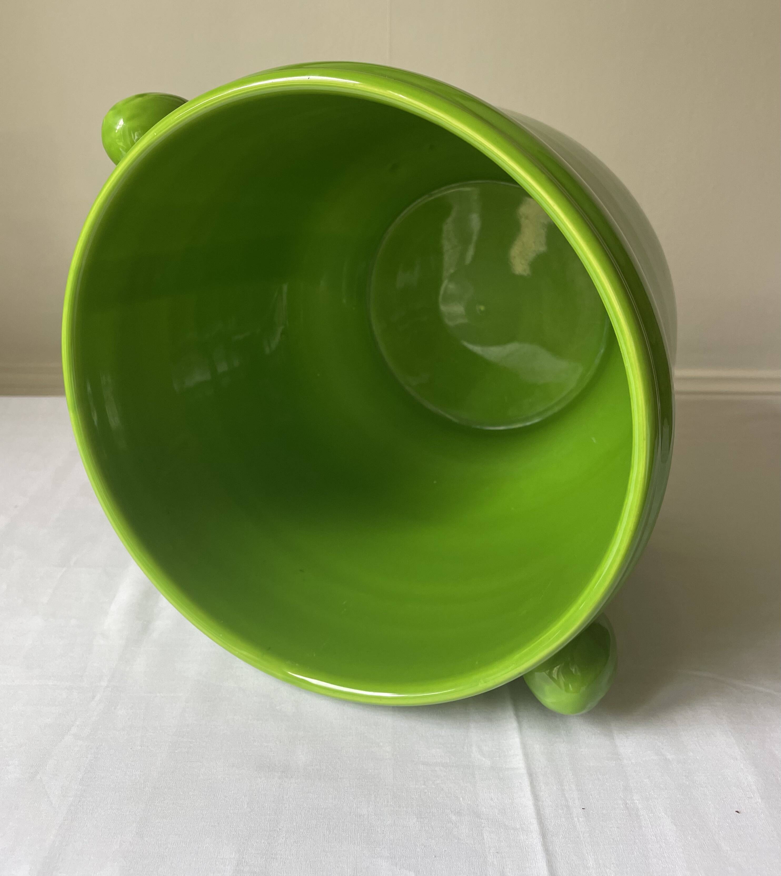 Glazed green pot cover in the style of Moreau Bourg earthenware