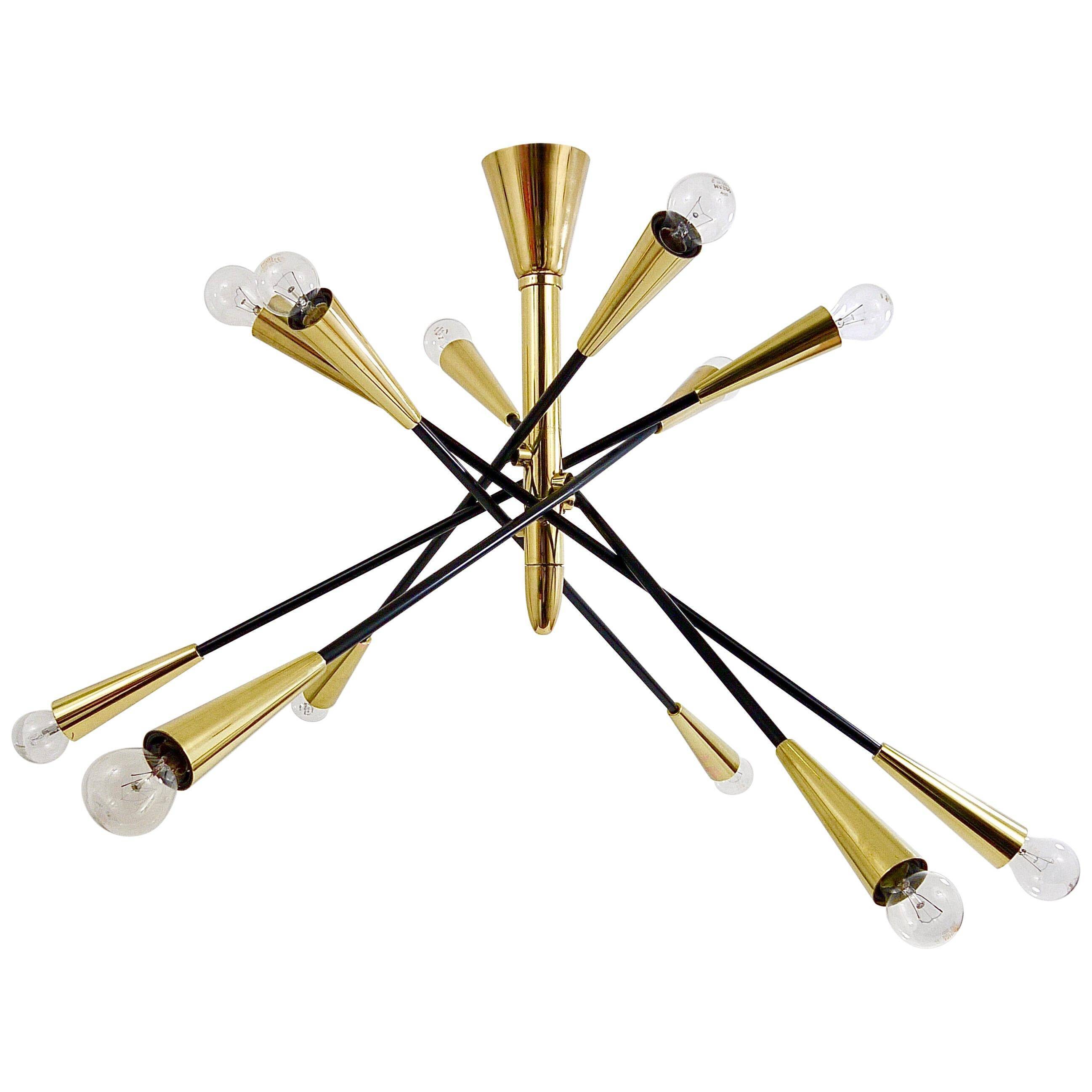 Black and brass articulated Sputnik chandelier in Stilnovo style, Italy, 1950.