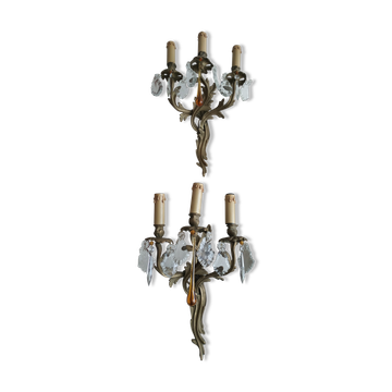 Pair of bronze and crystal sconces