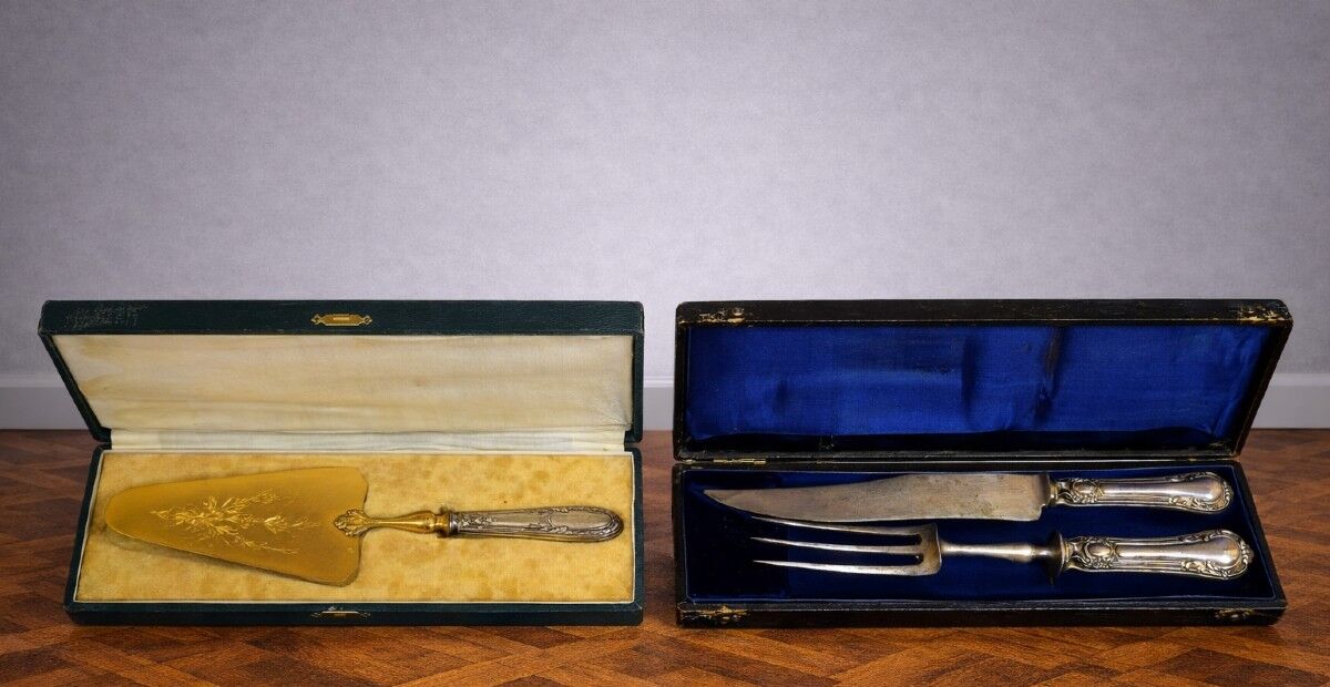 Table art: a meeting of two sets of silver-plated cutlery.