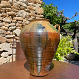 Ancient terracotta pottery jar from the 1920s.