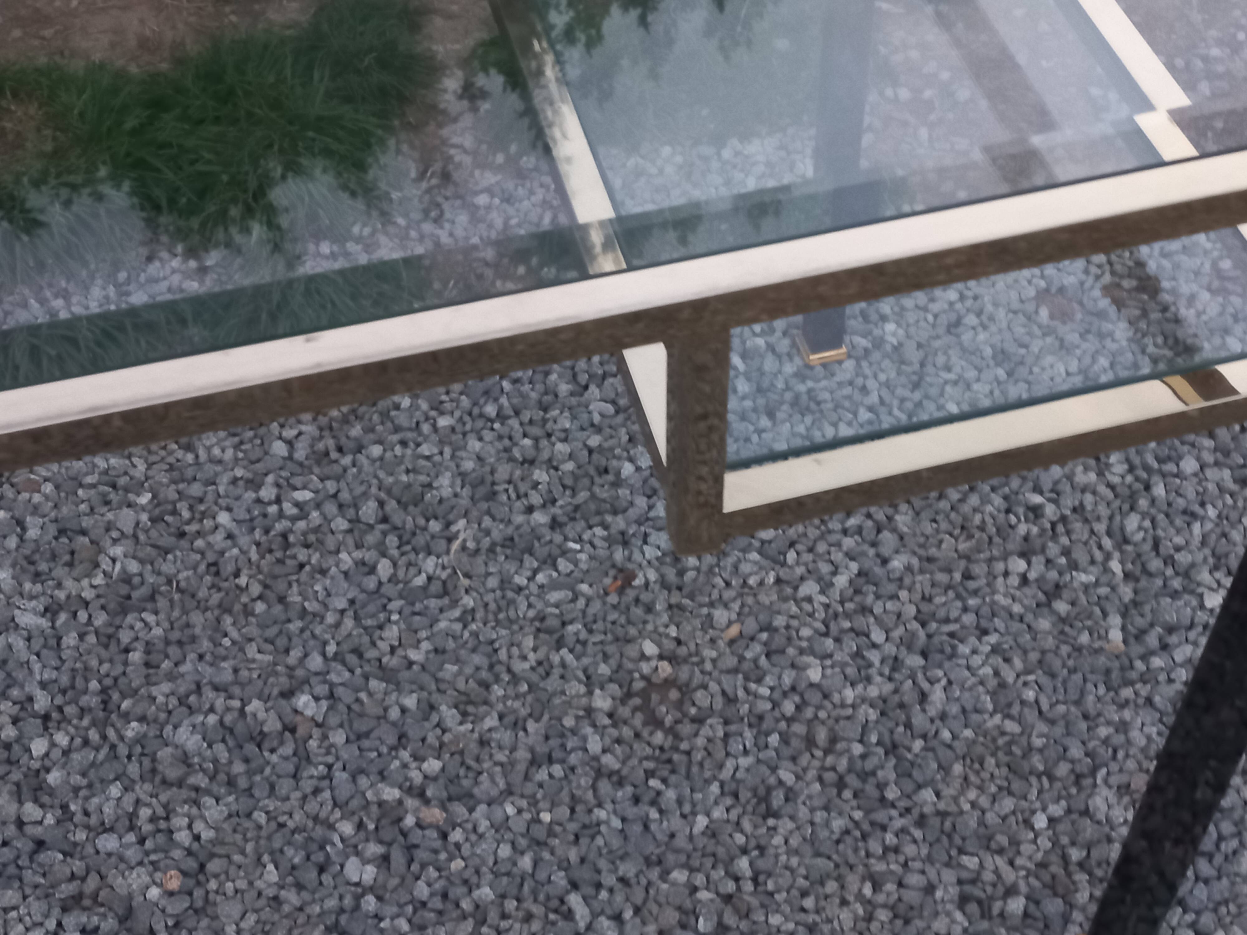 Golden and iridescent metal desk with a glass top from the 70s/80s.