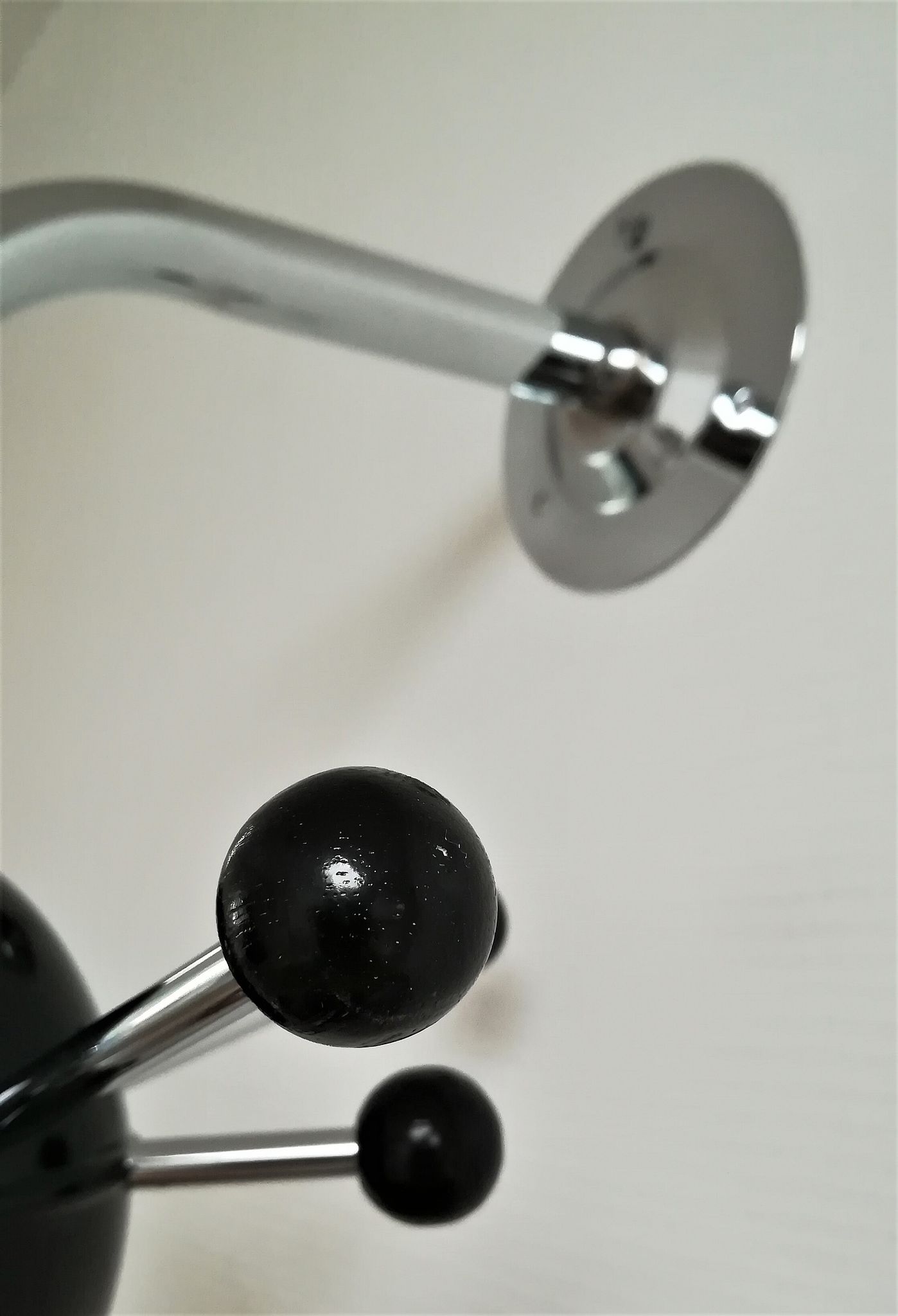 Black Sputnik coat rack and chrome 80s design