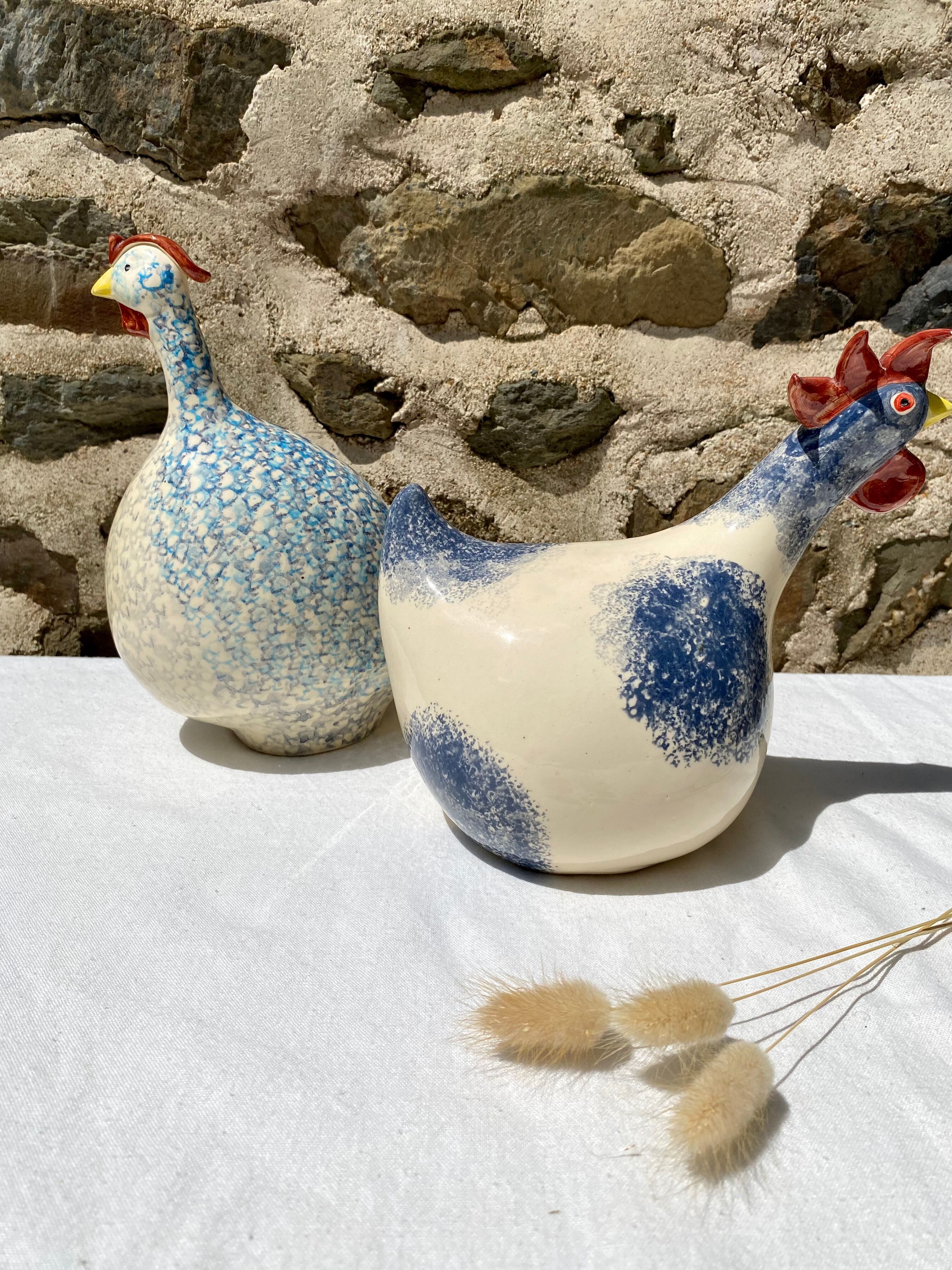 Signed ceramic hen and guinea fowl