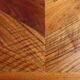 Antique solid walnut table with marquetry and extensions.