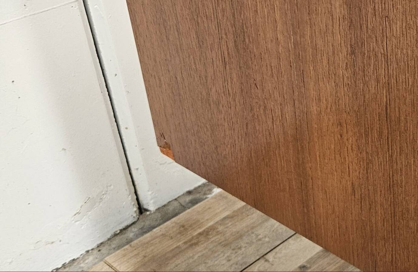 1960s walnut chest of drawers with iron and brass details