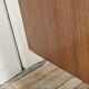 1960s walnut chest of drawers with iron and brass details