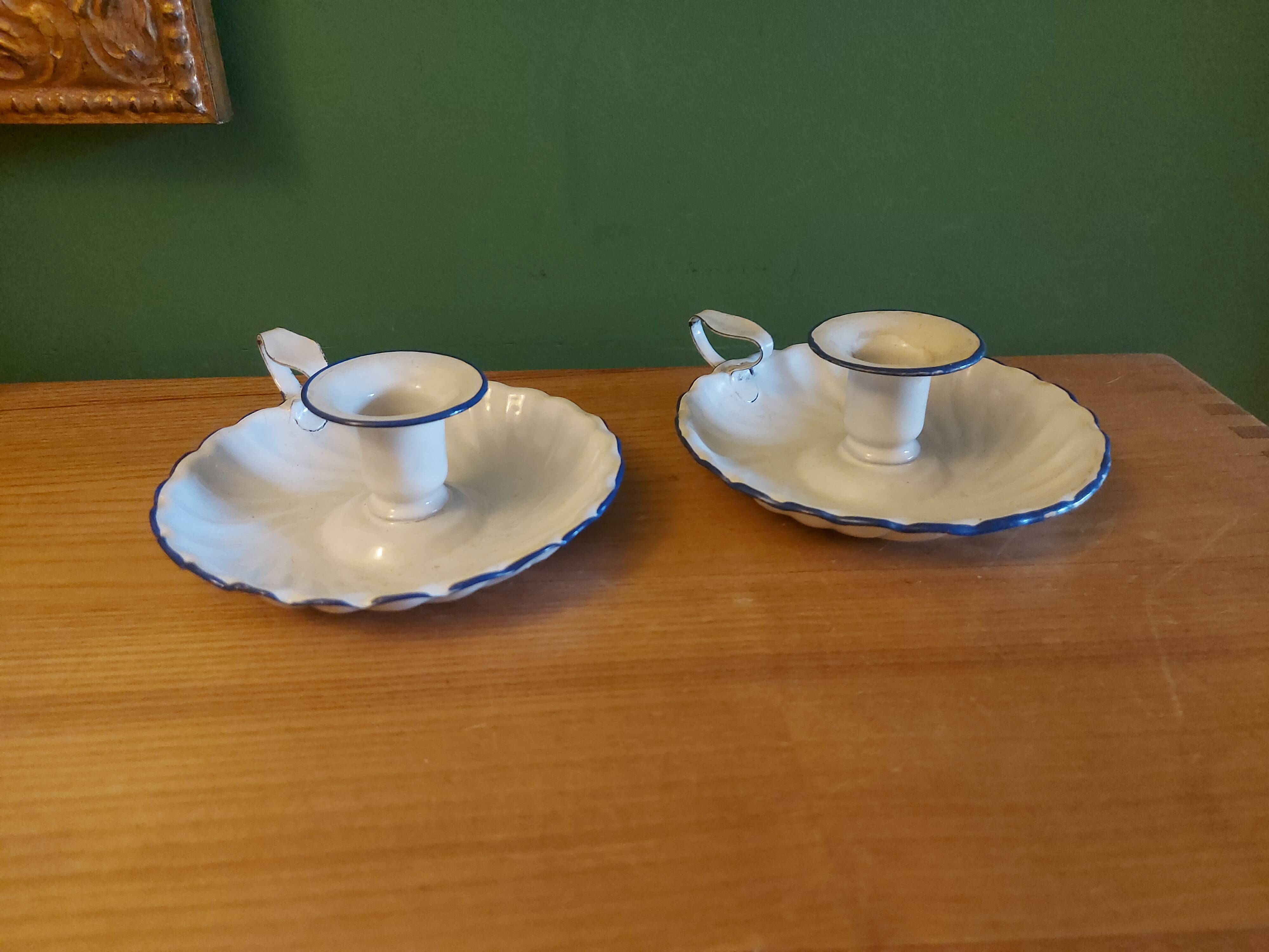 Pair of enamelled candle holders