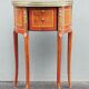 Neoclassical bedside table
