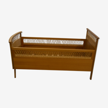 Child's bed in rattan of the years 50