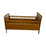 Child's bed in rattan of the years 50