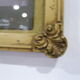 Former Art Deco photo frame with children's photo and wooden horse