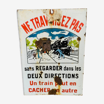 Enameled plaque “Don’t cross a train can hide another” 1930s