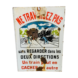 Plaque émaillée « Ne traversez pas un train peut en cacher un autre » années 30