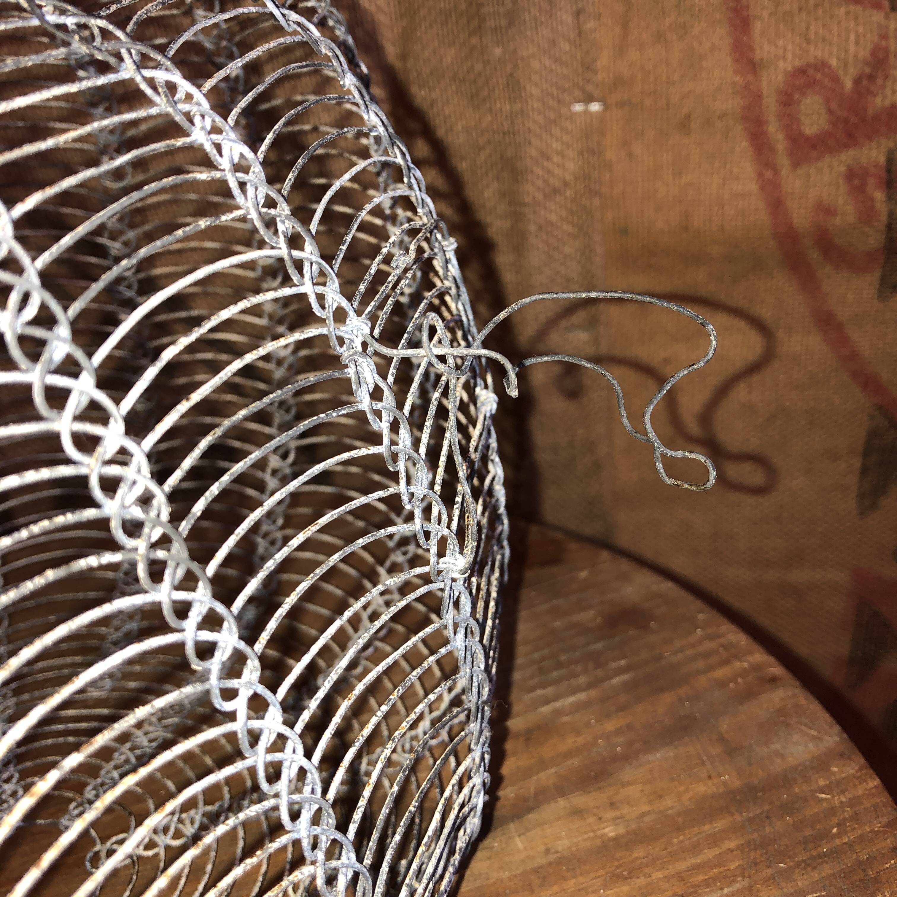 Old wire and mesh egg basket