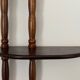 Turned wood wall shelf