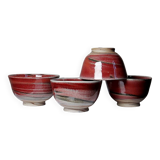 4 Japanese bowls in red glazed mixed stoneware