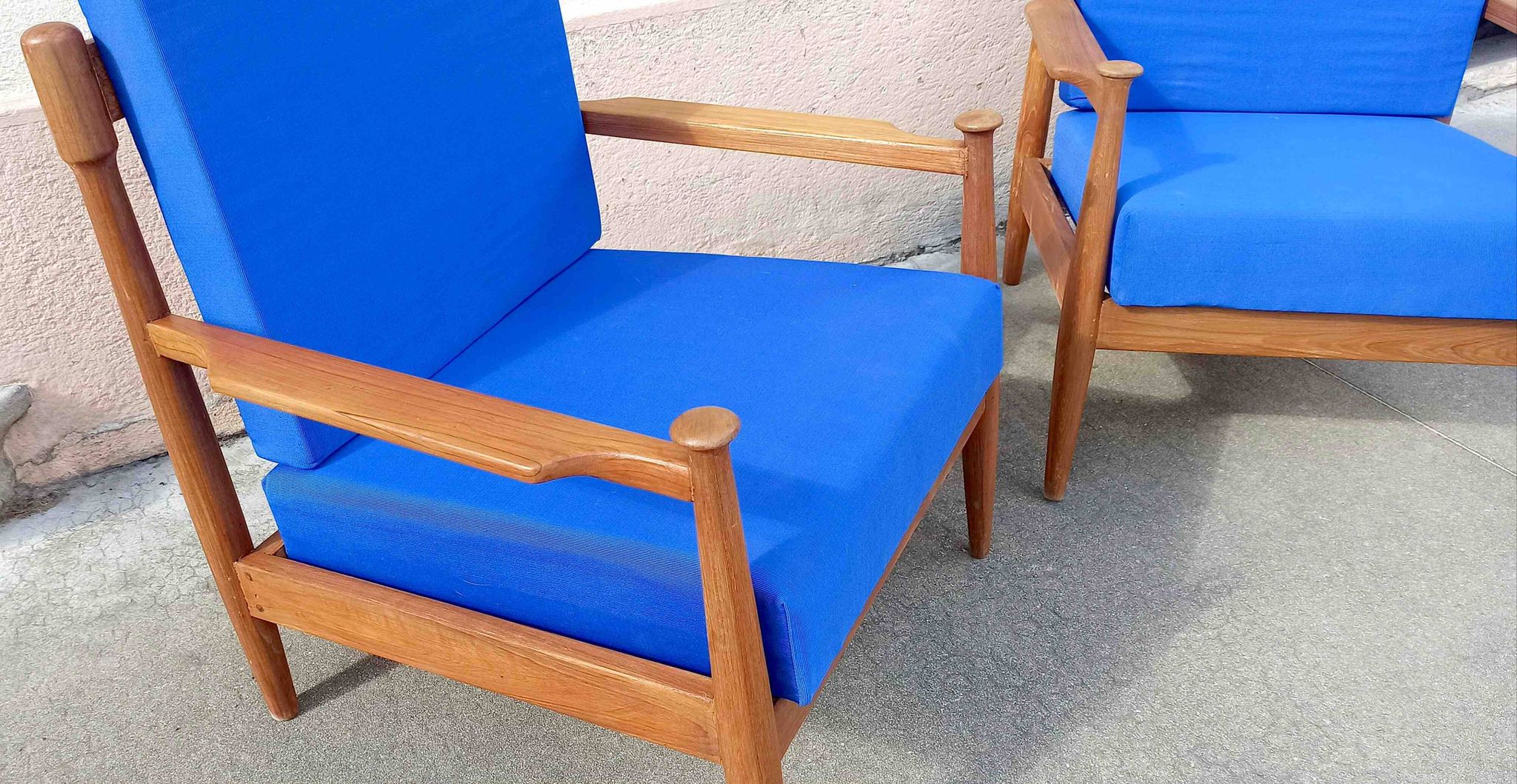 Pair of 1960s Scandinavian armchairs with blue cushions