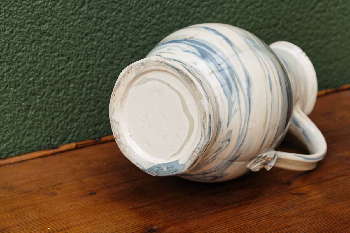 Water jug, signed, blue and white scrolls