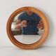 Vintage round wooden mirror
