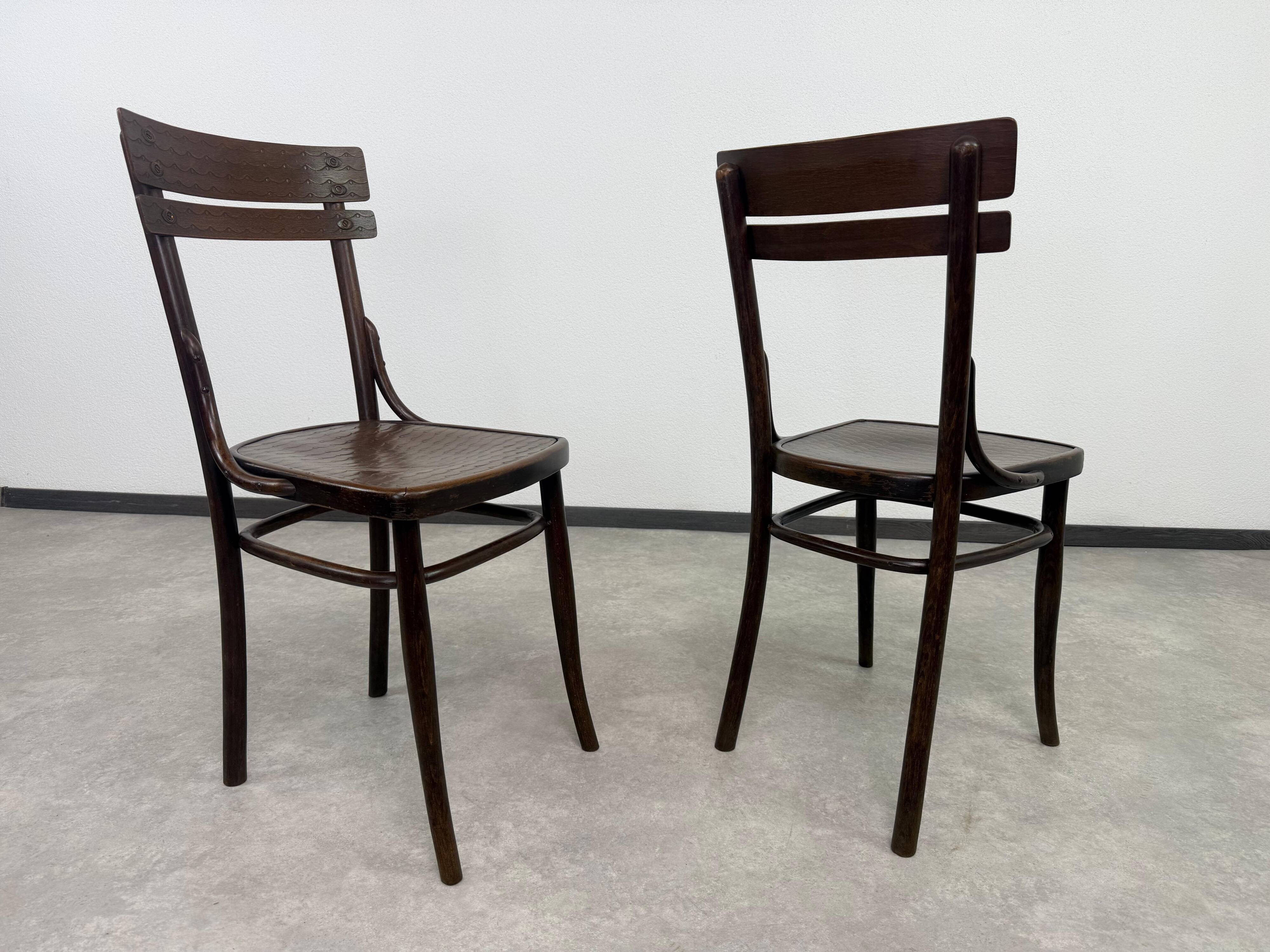 Set of 2 dining chairs by J&J Kohn
