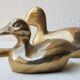 Trio of brass ducks