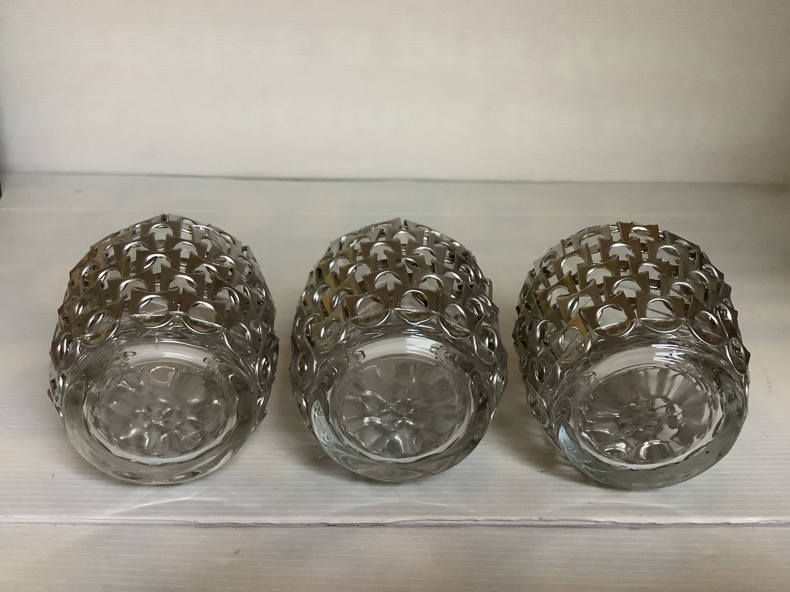 Trio of candle holders in metal strips folk art